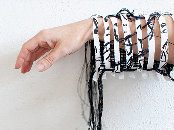 ink painted woven paper and linen sleeve worn on an outstretched arm